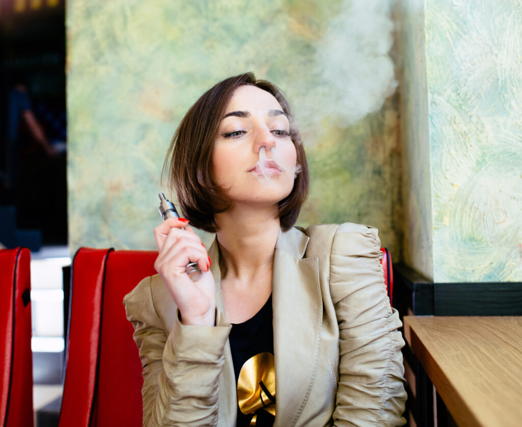 young woman smoking, smoking, cigarettes, How To Boost Your Fertility In Women