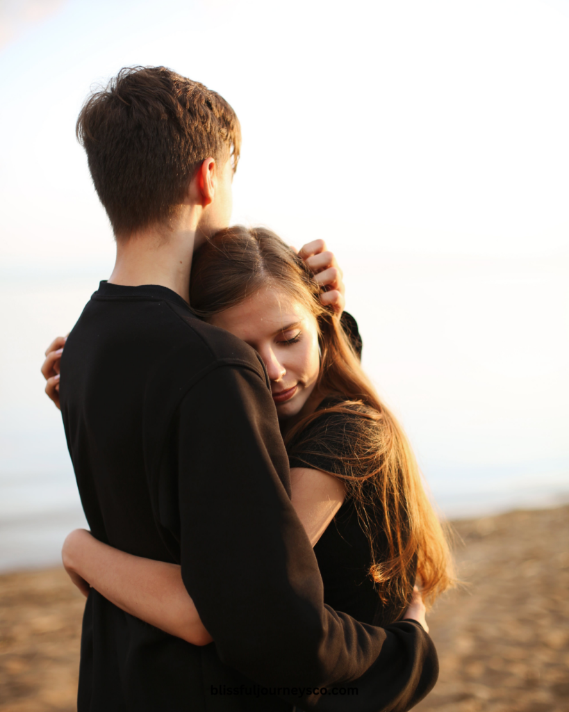 couple hugging after solving a relationship conflict