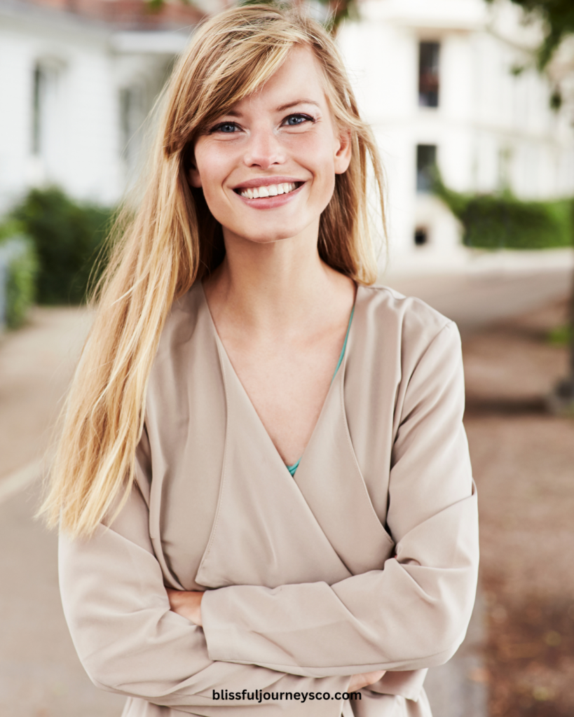 feminine woman smiling, ways to be more feminine, how to be more feminine, highly feminine women, feminine energy