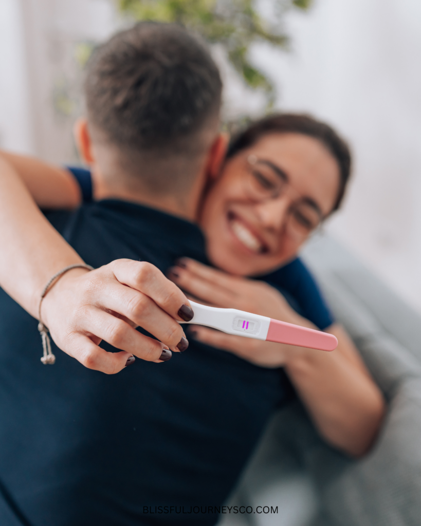 positive pregnancy test, trying to conceive, pregnancy, pregnant, couple, happy couple, happy parents, first trimester